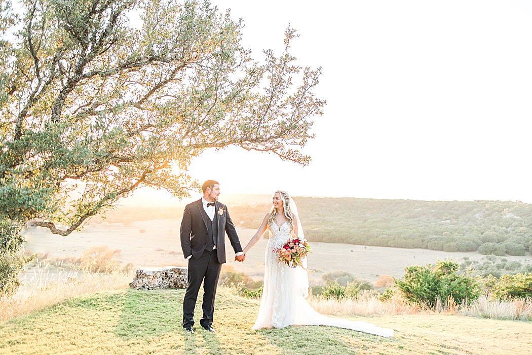 A Grey and Peach Fall Wedding at Contigo Ranch in Fredericksburg Texas by Allison Jeffers Photography 00043