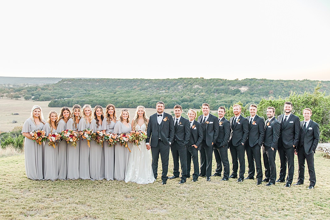 A Grey and Peach Fall Wedding at Contigo Ranch in Fredericksburg Texas by Allison Jeffers Photography 00056