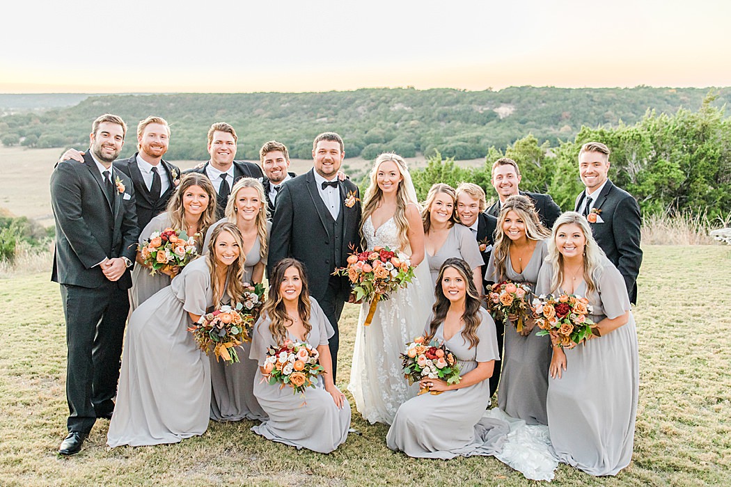 A Grey and Peach Fall Wedding at Contigo Ranch in Fredericksburg Texas by Allison Jeffers Photography 00058
