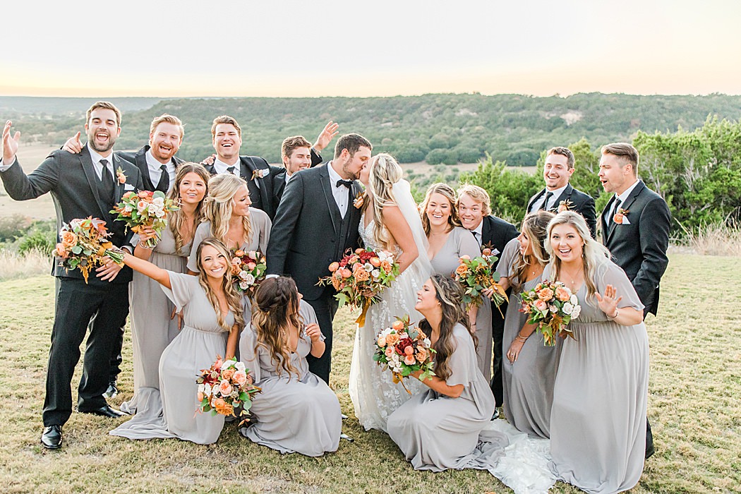A Grey and Peach Fall Wedding at Contigo Ranch in Fredericksburg Texas by Allison Jeffers Photography 00059